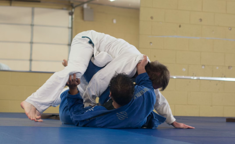 Jiu Jitsu competitors practicing to become better at non-violent martial arts.